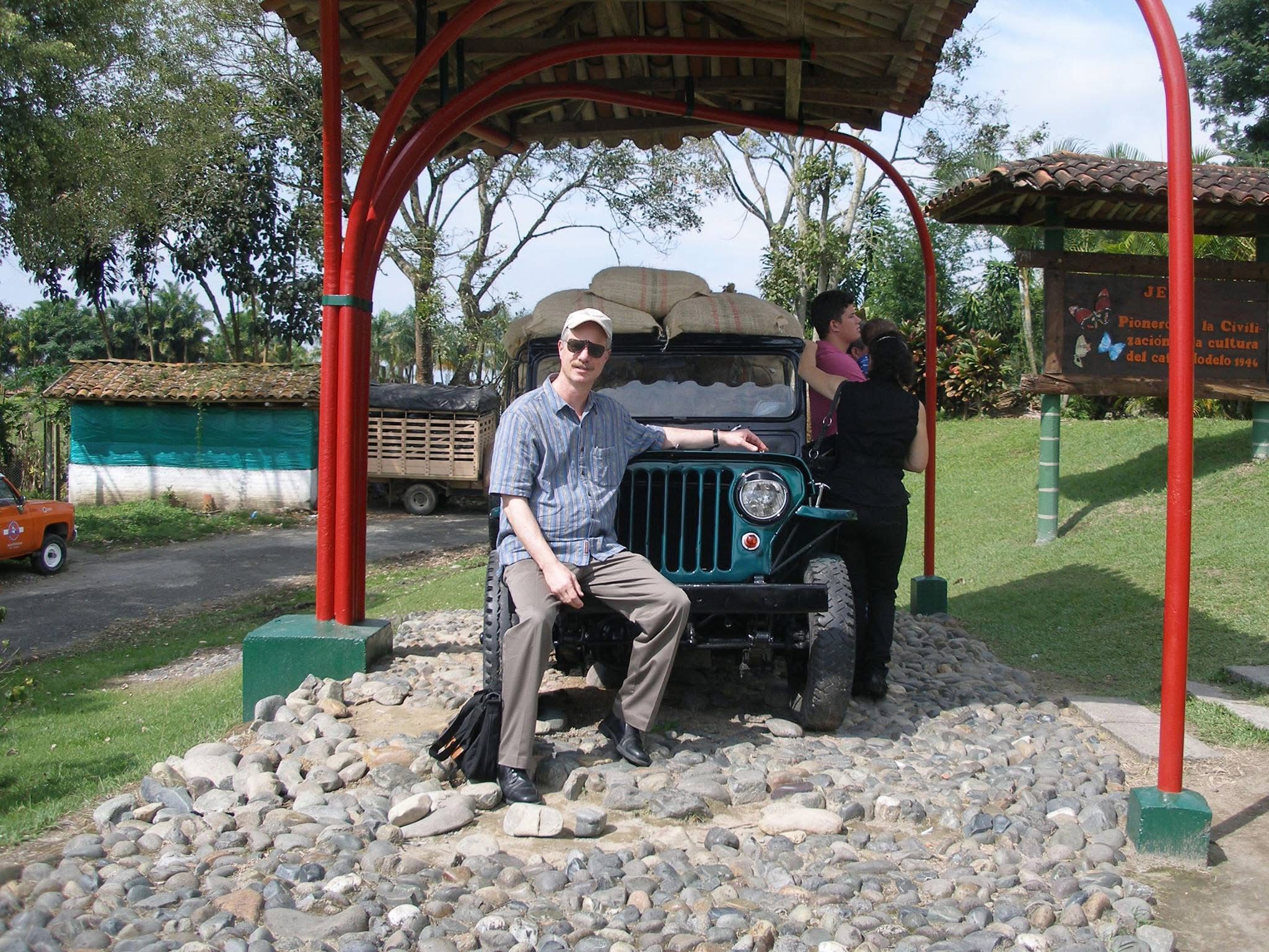 Robert beside a vehicle