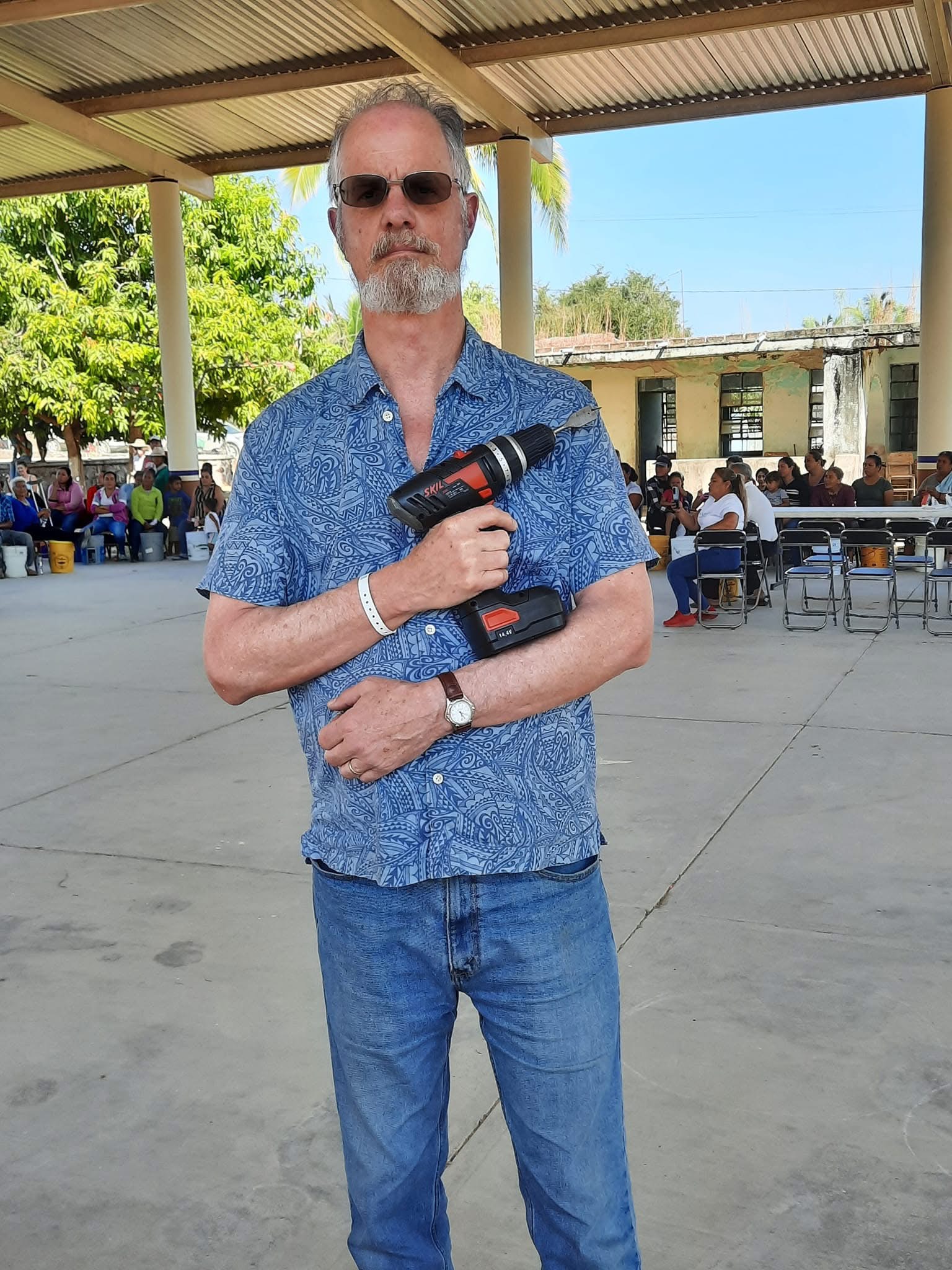Robert holding a microphone